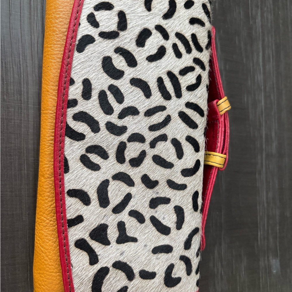 Elegant Leopard Print Clutch with Red and Yellow Accents